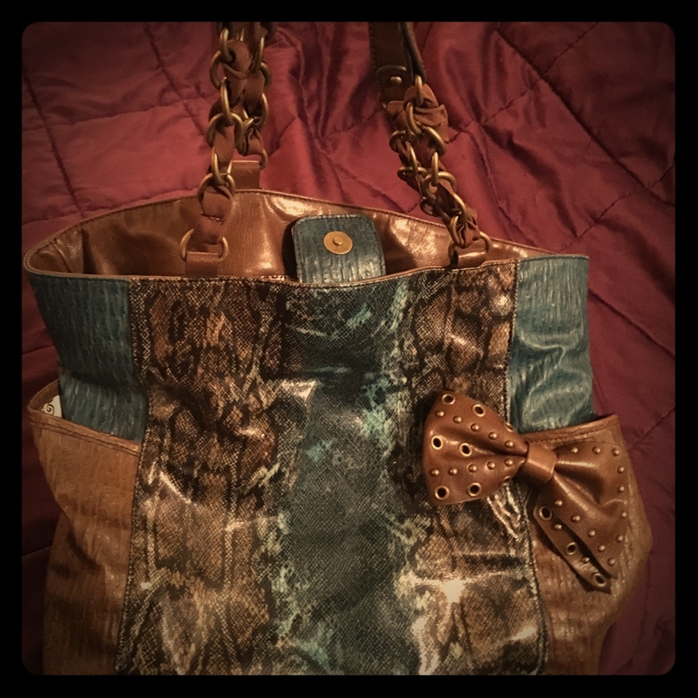 Snakeskin patent bag.